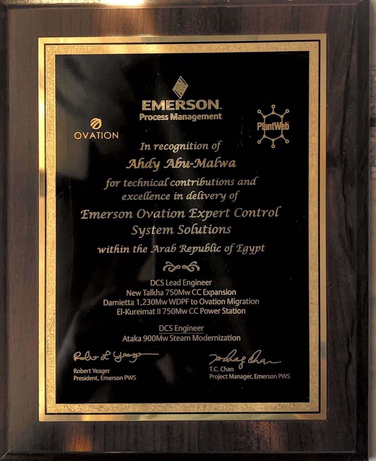 Emerson Process Management Ovation recognition plaque presented to Ahdy Abu-Malwa
